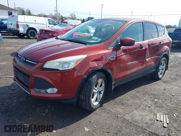 2014 Ford Escape SE with VIN 1FMCU9GX3EUA81161, listed as a IAAI auction lot 41968609 with 112,931 mi miles and . Bid and sale history available at DreamBid. Image 2.