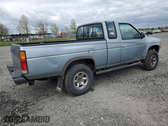 1993 Nissan Frontier SE z VIN 1N6HD16Y0PC408188, wystawiony jako Copart lot #71028394 z przebiegiem 258 939 mil mil oraz Szkoda całkowita • Salvage title. Historia ofert i sprzedaży dostępna na DreamBid. Obrazek 3.