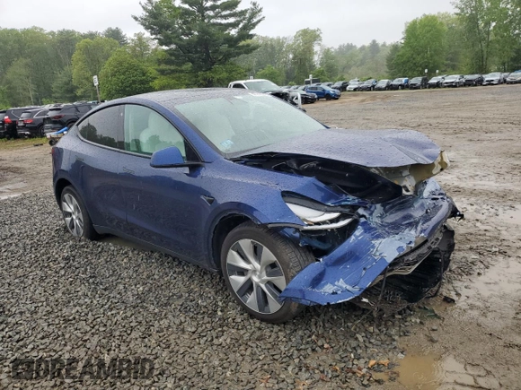 2022 Tesla Model Y Long Range z VIN 7SAYGDEE6NF318808, wystawiony jako Copart lot #57219915 z przebiegiem Nie podano mil oraz Szkoda całkowita • Salvage title. Historia ofert i sprzedaży dostępna na DreamBid. Obrazek 4.