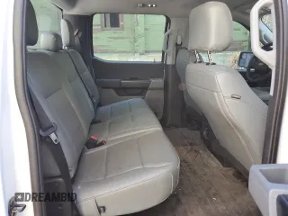 2023 Ford F-150 XL with VIN 1FTEW1EBXPKE80986, listed as a Copart auction lot 60357284 with 10,525 mi miles and Salvage Title. Bid and sale history available at carsss.com. Image 10.