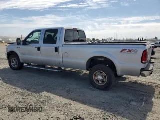 2004 Ford F-350 XL with VIN 1FTSW31P04EC44129, listed as a Copart auction lot 63519165 with 205,411 mi miles and Salvage title. Bid and sale history available at DreamBid. Image 2.