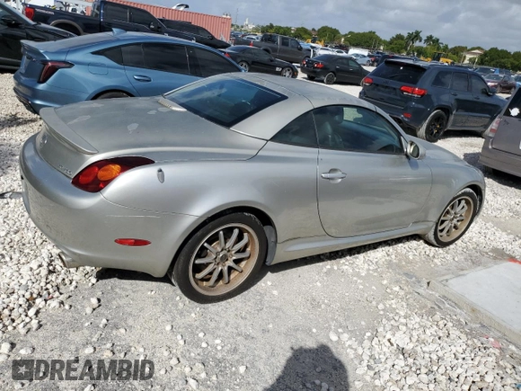 2004 Lexus SC 430 with VIN JTHFN48Y240051291, listed as a Copart auction lot 77631944 with 169,055 mi miles and Salvage Title. Bid and sale history available at DreamBid. Image 3.
