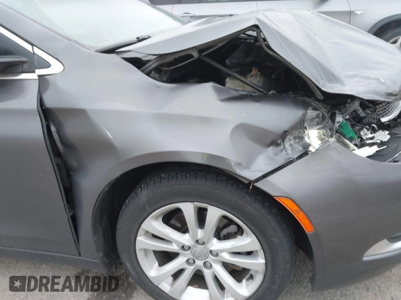 2015 Chrysler 200 Limited with VIN 1C3CCCAB1FN576170, listed as a IAAI auction lot 41893765 with 117,110 mi miles and . Bid and sale history available at DreamBid. Image 12.