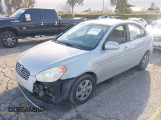 2006 Hyundai Accent GLS with VIN KMHCN46C86U007833, listed as a IAAI auction lot 41760603 with 60,030 mi miles. Bid and sale history available at carsss.com. Image 17.