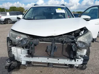 2018 Toyota RAV4 XLE with VIN JTMWFREV7JJ174483, listed as a IAAI auction lot 41597797 with 82,836 mi miles. Bid and sale history available at carsss.com. Image 6.