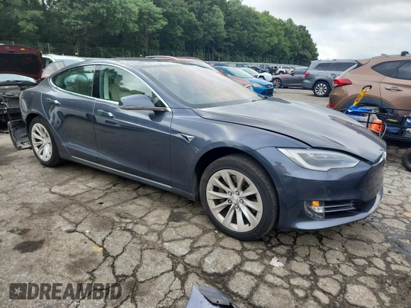 2017 Tesla Model S 60 z VIN 5YJSA1E18HF193461, wystawiony jako Copart lot #61040785 z przebiegiem 99 100 mil mil oraz Szkoda całkowita • Salvage title. Historia ofert i sprzedaży dostępna na DreamBid. Obrazek 4.