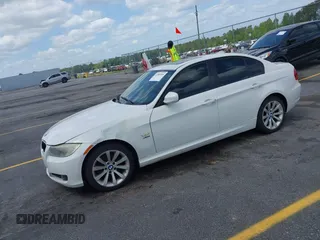 2011 BMW 3 Series 328i xDrive with VIN WBAPK5C51BF124871, listed as a IAAI auction lot 42081999 with 129,120 mi miles. Bid and sale history available at carsss.com. Image 2.