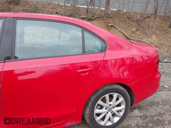 2015 Volkswagen Jetta Sedan 1.8T SE with VIN 3VWD17AJXFM303014, listed as a IAAI auction lot 41953494 with 92,145 mi miles. Bid and sale history available at carsss.com. Image 14.