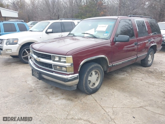 1999 Chevrolet Tahoe with VIN 1GNEC13R8XJ511786, listed as a IAAI auction lot 41538890 with 196,764 mi miles. Bid and sale history available at carsss.com. Image 2.