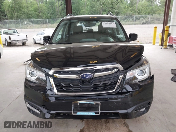 2018 Subaru Forester Touring with VIN JF2SJAWC2JH598982, listed as a IAAI auction lot 42455652 with 57,254 mi miles and . Bid and sale history available at DreamBid. Image 13.