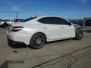 2022 Genesis G70 2.0T z VIN KMTG34TA1NU103382, wystawiony jako Copart lot #49459415 z przebiegiem 28 399 mil mil oraz Szkody całkowita. Historia ofert i sprzedaży dostępna na DreamBid. Obrazek 3.