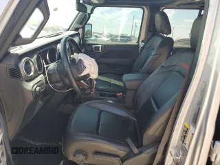 2022 Jeep Gladiator Rubicon z VIN 1C6JJTBG6NL104521, wystawiony jako Copart lot #57325365 z przebiegiem 31 498 mil mil oraz Szkoda całkowita • Salvage title. Historia ofert i sprzedaży dostępna na DreamBid. Obrazek 7.