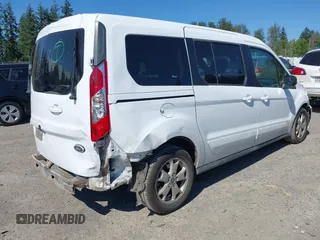 2014 Ford Transit Connect XLT z VIN NM0GS9F75E1141212, wystawiony jako IAAI lot #42691464 z przebiegiem 101 475 mil mil oraz . Historia ofert i sprzedaży dostępna na DreamBid. Obrazek 6.