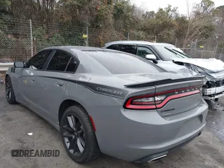 2019 Dodge Charger SXT with VIN 2C3CDXBG6KH667548, listed as a IAAI auction lot 41114669 with 112,233 mi miles. Bid and sale history available at carsss.com. Image 3.
