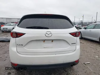 2021 Mazda CX-5 Grand Touring with VIN JM3KFADM4M1340141, listed as a IAAI auction lot 41194711 with 37,887 mi miles. Bid and sale history available at carsss.com. Image 16.