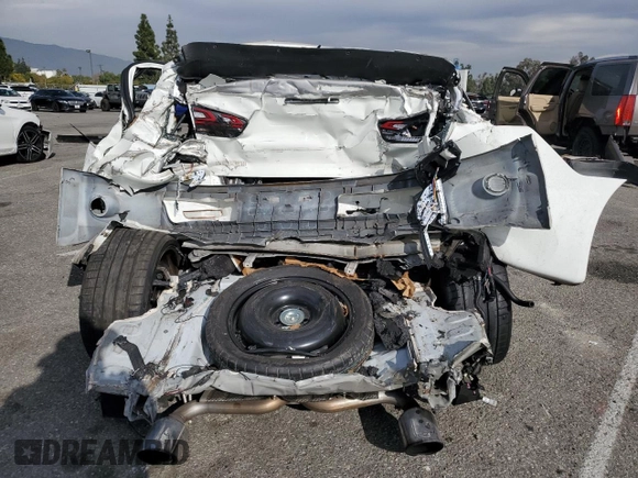 2014 Mitsubishi Lancer Evolution GSR z VIN JA32W8FV2EU019253, wystawiony jako Copart lot #86615084 z przebiegiem 104 894 mil mil oraz Szkody całkowita. Historia ofert i sprzedaży dostępna na DreamBid. Obrazek 6.