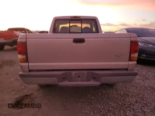 1997 Ford Ranger Splash with VIN 1FTCR14U4VPA82917, listed as a Copart auction lot 87528195 with Not provided miles and Clean title. Bid and sale history available at DreamBid. Image 6.