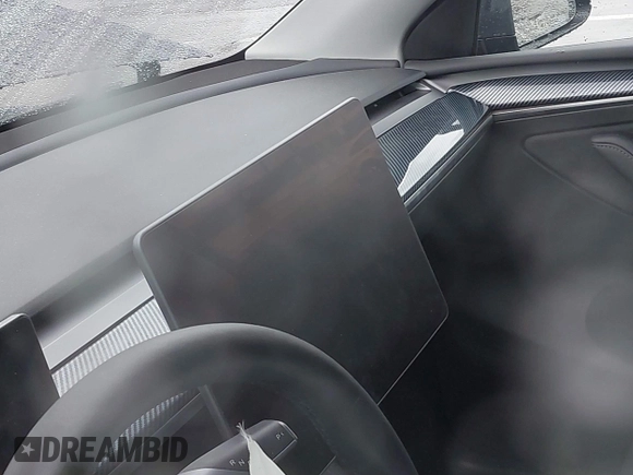 2023 Tesla Model Y Performance with VIN 7SAYGDEF0PF774282, listed as a IAAI auction lot 41807031 with Not Provided miles and . Bid and sale history available at DreamBid. Image 17.