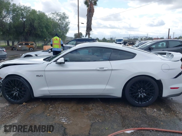 2018 Ford Mustang GT z VIN 1FA6P8CF5J5154590, wystawiony jako IAAI lot #41588857 z przebiegiem 113 805 mil mil oraz . Historia ofert i sprzedaży dostępna na DreamBid. Obrazek 13.