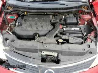 2007 Nissan Versa S z VIN 3N1BC13E27L446857, wystawiony jako Copart lot #54938895 z przebiegiem 243 248 mil mil oraz Szkoda całkowita • Salvage title. Historia ofert i sprzedaży dostępna na DreamBid. Obrazek 11.