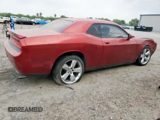 2013 Dodge Challenger SXT z VIN 2C3CDYAG3DH645792, wystawiony jako Copart lot #57351105 z przebiegiem 170 572 mil mil oraz Szkoda całkowita • Salvage title. Historia ofert i sprzedaży dostępna na DreamBid. Obrazek 3.