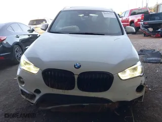 2018 BMW X1 xDrive28i with VIN WBXHT3C32J5K29627, listed as a IAAI auction lot 40995212 with 64,162 mi miles. Bid and sale history available at carsss.com. Image 12.