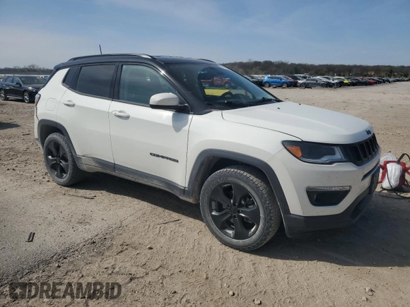 2020 Jeep Compass Latitude with VIN 3C4NJDBB6LT157600, listed as a Copart auction lot 52411235 with 82,159 mi miles and Salvage title. Bid and sale history available at DreamBid. Image 4.