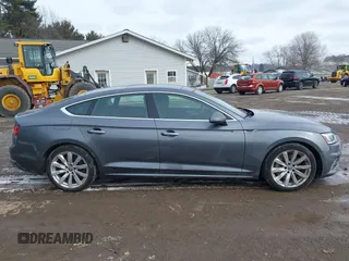 2018 Audi A5 Sportback Premium Plus z VIN WAUBNCF52JA124956, wystawiony jako IAAI lot #41606230 z przebiegiem 100 067 mil mil oraz . Historia ofert i sprzedaży dostępna na DreamBid. Obrazek 13.