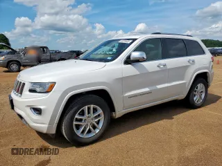 2016 Jeep Grand Cherokee Overland z VIN 1C4RJECG9GC464276, wystawiony jako Copart lot #60876455 z przebiegiem 165 746 mil mil oraz Szkoda całkowita • Salvage title. Historia ofert i sprzedaży dostępna na DreamBid. Obrazek 1.