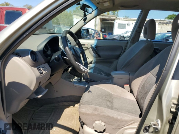 2002 Toyota RAV4 with VIN JTEGH20V520073278, listed as a Copart auction lot 69788074 with 246,562 mi miles and Salvage title. Bid and sale history available at DreamBid. Image 7.