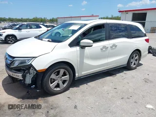 2018 Honda Odyssey EX-L z VIN 5FNRL6H76JB111027, wystawiony jako IAAI lot #42234196 z przebiegiem 88 855 mil mil oraz . Historia ofert i sprzedaży dostępna na DreamBid. Obrazek 2.
