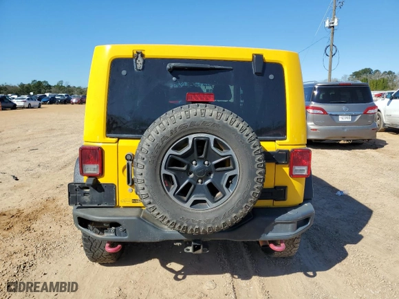 2015 Jeep Wrangler Unlimited Rubicon Hard Rock with VIN 1C4HJWFG4FL648732, listed as a Copart auction lot 88690435 with 196,650 mi miles and Salvage Title. Bid and sale history available at carsss.com. Image 6.