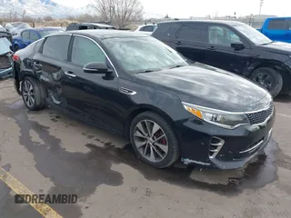 2016 Kia Optima SX Turbo with VIN 5XXGW4L2XGG052746, listed as a IAAI auction lot 41306792 with 69,571 mi miles and . Bid and sale history available at carsss.com. Image 1.
