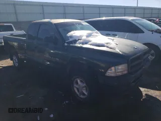 1999 Dodge Dakota SLT with VIN 1B7GG22X0XS239398, listed as a Copart auction lot 80143414 with 147,646 mi miles and Salvage Title. Bid and sale history available at DreamBid. Image 4.
