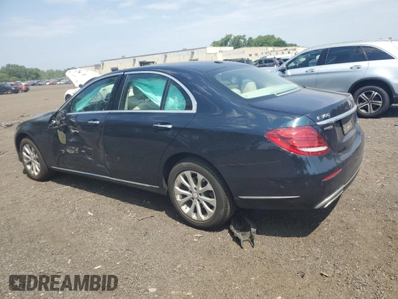 2017 Mercedes-Benz E 300 Luxury with VIN WDDZF4KBXHA185598, listed as a Copart auction lot 61011935 with 59,116 mi miles and Salvage title. Bid and sale history available at DreamBid. Image 2.