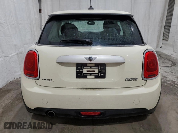 2015 MINI Hardtop with VIN WMWXM5C58FT973235, listed as a Copart auction lot 49988015 with 119,683 mi miles and Salvage Title. Bid and sale history available at DreamBid. Image 6.
