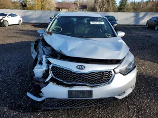 2016 Kia Forte LX z VIN KNAFX4A64G5451913, wystawiony jako Copart lot #69531003 z przebiegiem 117 269 mil mil oraz Szkoda całkowita • Salvage title. Historia ofert i sprzedaży dostępna na DreamBid. Obrazek 5.