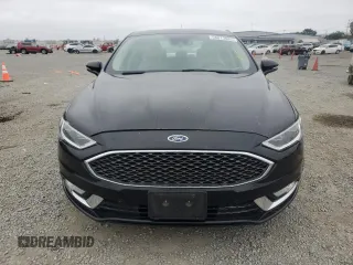 2017 Ford Fusion Titanium z VIN 3FA6P0SU5HR105415, wystawiony jako Copart lot #59779715 z przebiegiem 88 988 mil mil oraz Szkoda całkowita • Salvage title. Historia ofert i sprzedaży dostępna na DreamBid. Obrazek 5.