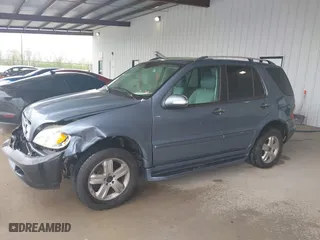 2005 Mercedes-Benz M-Class 3.7L with VIN 4JGAB57E25A560516, listed as a IAAI auction lot 41898369 with 125,927 mi miles. Bid and sale history available at carsss.com. Image 2.