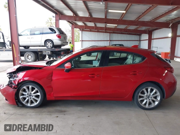 2014 Mazda 3 S Grand Touring with VIN JM1BM1M38E1200696, listed as a IAAI auction lot 41906426 with 50,048 mi miles and . Bid and sale history available at DreamBid. Image 14.