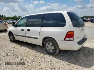 2003 Ford Windstar z VIN 2FMZA50493BA32884, wystawiony jako Copart lot #61452125 z przebiegiem 103 295 mil mil oraz Czysty tytuł • Clean title. Historia ofert i sprzedaży dostępna na DreamBid. Obrazek 2.