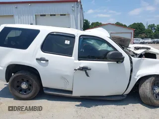 2013 Chevrolet Tahoe Commercial with VIN 1GNLC2E08DR216213, listed as a IAAI auction lot 37406061 with Not provided miles and . Bid and sale history available at DreamBid. Image 13.