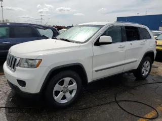 2011 Jeep Grand Cherokee Laredo z VIN 1J4RR4GG8BC544572, wystawiony jako Copart lot #56044325 z przebiegiem 160 313 mil mil oraz Czysty tytuł • Clean title. Historia ofert i sprzedaży dostępna na DreamBid. Obrazek 1.