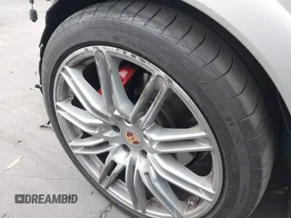 2014 Porsche Cayenne GTS z VIN WP1AD2A29ELA76227, wystawiony jako IAAI lot #42057978 z przebiegiem 92 174 mil mil oraz . Historia ofert i sprzedaży dostępna na DreamBid. Obrazek 22.