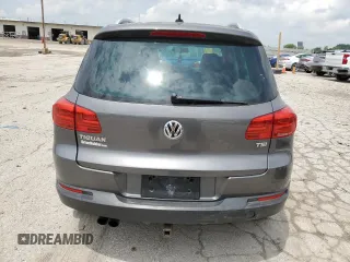 2012 Volkswagen Tiguan SE z VIN WVGAV7AX4CW001417, wystawiony jako Copart lot #61105865 z przebiegiem 168 110 mil mil oraz Czysty tytuł • Clean title. Historia ofert i sprzedaży dostępna na DreamBid. Obrazek 6.