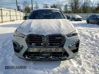 2024 BMW X6 M with VIN 5YM23ET0XR9U26576, listed as a Copart auction lot 86698164 with 6,669 mi miles and Salvage Title. Bid and sale history available at carsss.com. Image 11.