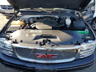 2005 GMC Sierra Denali z VIN 2GTEK63N551188181, wystawiony jako Copart lot #43548845 z przebiegiem 2 417 198 mil mil oraz Szkody całkowita. Historia ofert i sprzedaży dostępna na DreamBid. Obrazek 11.