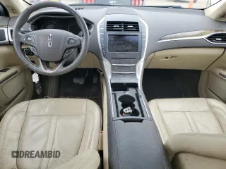2014 Lincoln MKZ z VIN 3LN6L2GK9ER825882, wystawiony jako Copart lot #53332435 z przebiegiem 114 677 mil mil oraz Szkoda całkowita • Salvage title. Historia ofert i sprzedaży dostępna na DreamBid. Obrazek 8.