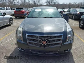 2009 Cadillac CTS RWD w/1SA with VIN 1G6DF577790133127, listed as a IAAI auction lot 41810358 with 220,278 mi miles. Bid and sale history available at carsss.com. Image 6.