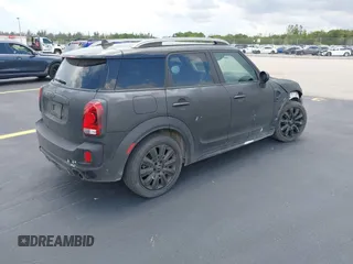 2018 MINI Countryman Cooper S z VIN WMZYT3C35J3E00804, wystawiony jako IAAI lot #42194381 z przebiegiem 101 634 mil mil oraz . Historia ofert i sprzedaży dostępna na DreamBid. Obrazek 4.